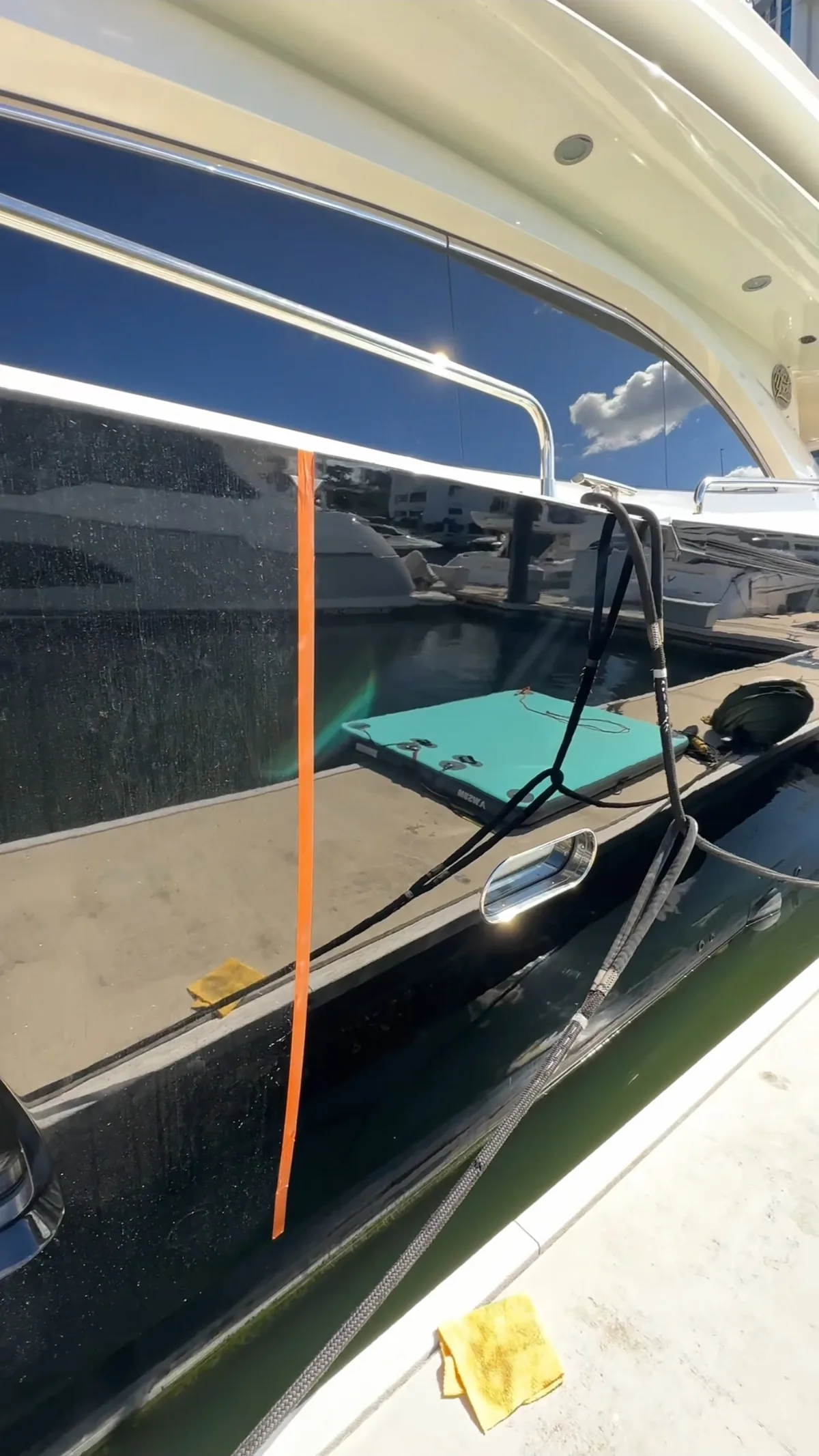 Polished yacht hull and windows after cleaning