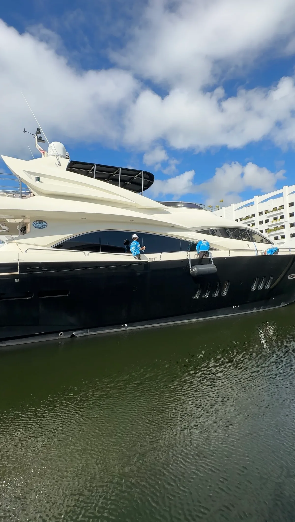 Boat Care 360 team working on a luxury yacht